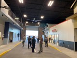People walking through the MPD scenario village.
