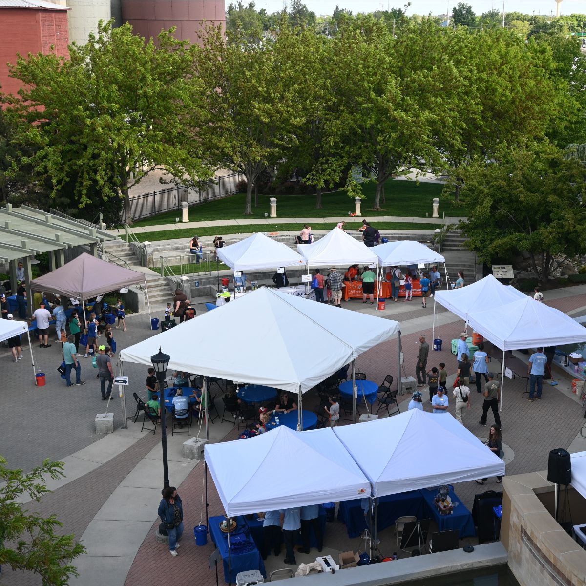 Aerial view of Expo: Event tents with people and various activities